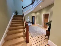 Victorian stone mansion in extensive grounds overlooking Bala Lake