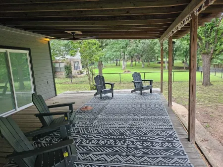 Newly Renovated 1.5 Acre Lake Front Home with Game Room and Direct Lake Access.