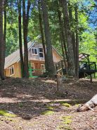 Spacious cabin on beautiful Long Lake w/waterfront view, private dock, fire pit.