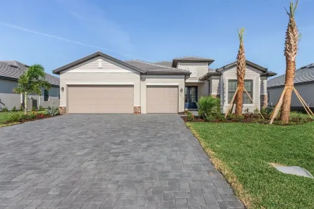 Great Location! 2,444 sq ft canal front villa with heated pool/spa.