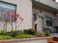 Apartment with View of the Tuscan Coast and Garden