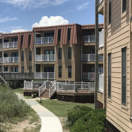 Enjoy an oceanfront getaway with beautiful beach steps from your door.