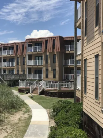 Enjoy an oceanfront getaway with beautiful beach steps from your door.