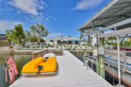 Spacious waterfront home in Apollo Beach w/ private swimming pool and boat dock.