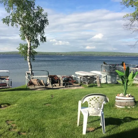 Vacation Stay at Hubbard Lake Air-Conditioned Lakefront Mobile Home