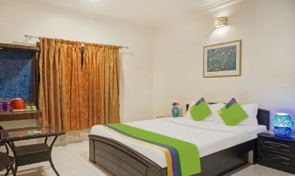 Treebo Excellent Home Hotels near Osho Teerth Park