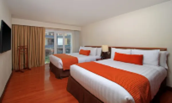 Hotel Windsor House Inn by Geh Suites Hoteles cerca de Parque de la 93