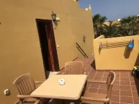 Holiday flat in a beautiful complex with large swimming pool and private terrace