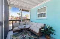 Deeded Beach Access and Private Balcony - Charming Coastal Haven