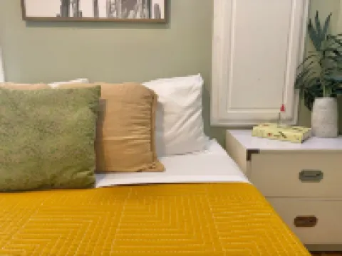 Private Parking and Sunny Front Porch - Charming Cottage Oasis