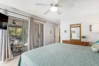 Dog-friendly beach home with screened porch, charming interior, & W/D