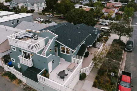 Spacious Outdoor Decks and Two Family Rooms - Charming Coastal Retreat