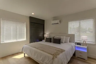 Executive Suite with Luxurious Kitchen and Free Wi-Fi - Charming Oasis