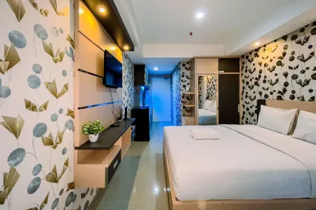 Simple and Cozy Studio Tamansari Skylounge Makassar Apartment Отели в г. Marusu
