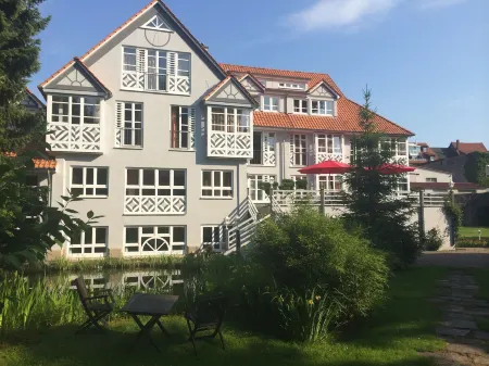 Romantisches Hotel Menzhausen Отели в г. Хардегзен