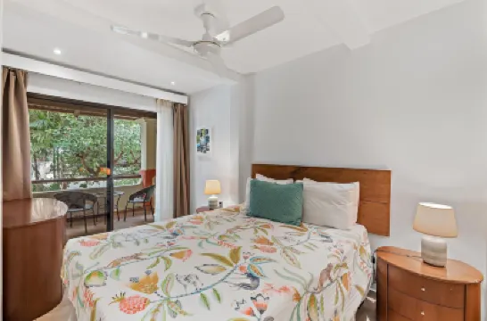Colorful & Private 2-Bedroom Condo Just a Short Walk from the Beach Hotels in 