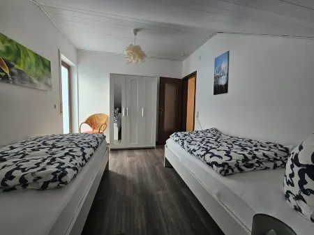 Beautiful vacation apartment on the edge of the forest with three bedrooms. Отели в г. Оденвальд