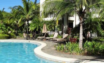 Ground-Floor Unit in Front of Lazy River Pool at Pacifico in Coco