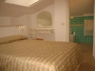 Top floor penthouse apartment with terrace in the historical center, 3 km from the beach Hotels near Oristano