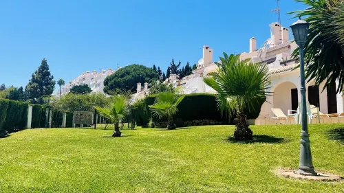 Modern garden apartment with a fantastic view of the sea and a private garden