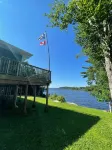 Blue Lodge with cozy winter garden and direct lake access