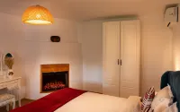Traditional house with one bedroom apartment/ fireplace and porch.