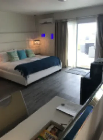 The Salty Mermaid Oceanfront Hotel