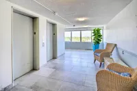 Steps to Sand Satellite Beach Condo with Views!
