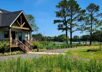 Secluded waterfront getaway with hot tub,fire pit, and private dock.