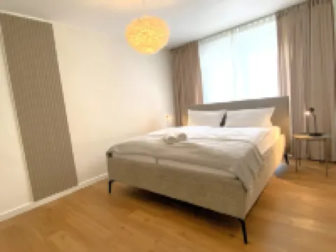 5 Minutes from the University– Work-Life Balance Apartment with Balcony and Crib