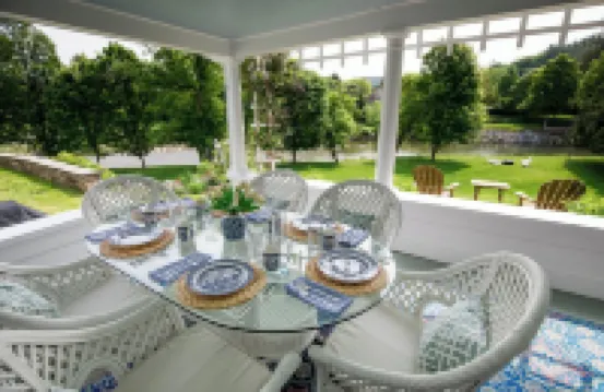 Premier Woodstock Village Riverfront Home