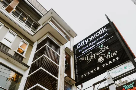 The Citywalk Suites Apartment Inc. Отели рядом с достопримечательностью «Университет Рисаль Систем, Бинангонан Кампус»