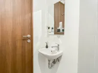 Modern Studio at LRT City Sentul - Royal Sentul Park Apartment By Travelio