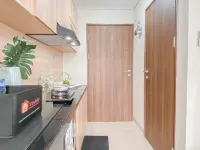 Soft Ivory Studio at Royal Sentul Park Apartment  By Travelio