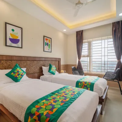Treebo Viswa Vikas Residency Hotels near Kovai Kutralam Falls