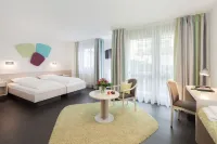 Hotel Akazienhaus Отели рядом с достопримечательностью «Stammhaus Dassler»