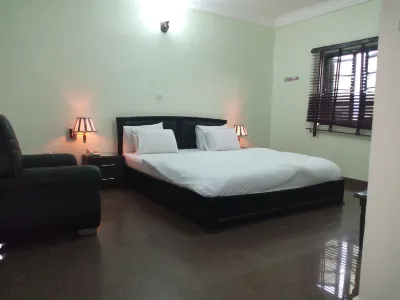 Dionzec Hotel & Suites Hotels near Shop Egbeda Lagos