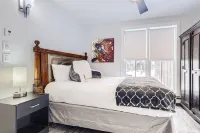 7 Bedroom, 3 Parking Spots,AC, Centrally Located on Main Street Next to Gondola!