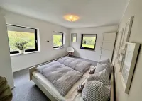 Ferienhaus in Strandnähe mit Etwas Meerblick, Balkon, Loggia, Garten in Meierwik