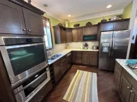 Spacious 5-bedroom, 5-bathroom townhome with WiFi, AC, Priv Hottub, ElecCharging