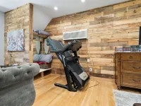 Studio above a detached garage away from main house on a private lot.