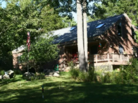 Peaceful Basement Apartment among serene woods, paths, and a stream near Acadia Hotels in Mt Desert