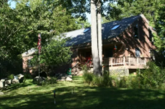 Peaceful Basement Apartment among serene woods, paths, and a stream near Acadia