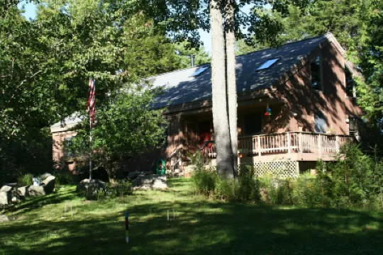 Peaceful Basement Apartment among serene woods, paths, and a stream near Acadia