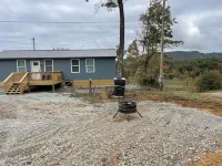 New Cabin with many amenities! Trail systems. Sleeps 8! Royal blue brimstone