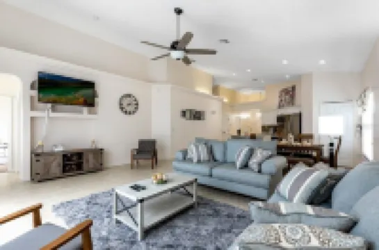 Lovely home near Disney with a Heated pool and game room in a resort community.