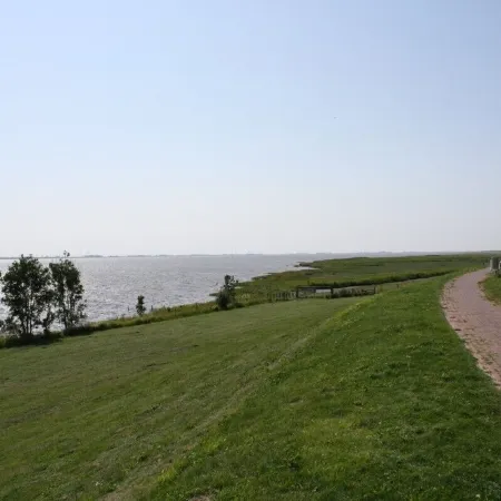 near the dyke (30m) and green beach, sea water swimming pool