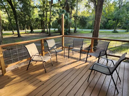 1-1/2 acre Park like wooded setting.  Clean 3/2 with plenty of parking.