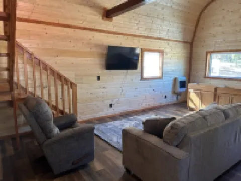 White cabin in the woods close to Univ. of Central Missouri and Whiteman AF Base