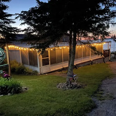 Vacation Stay at Hubbard Lake Air-Conditioned Lakefront Mobile Home